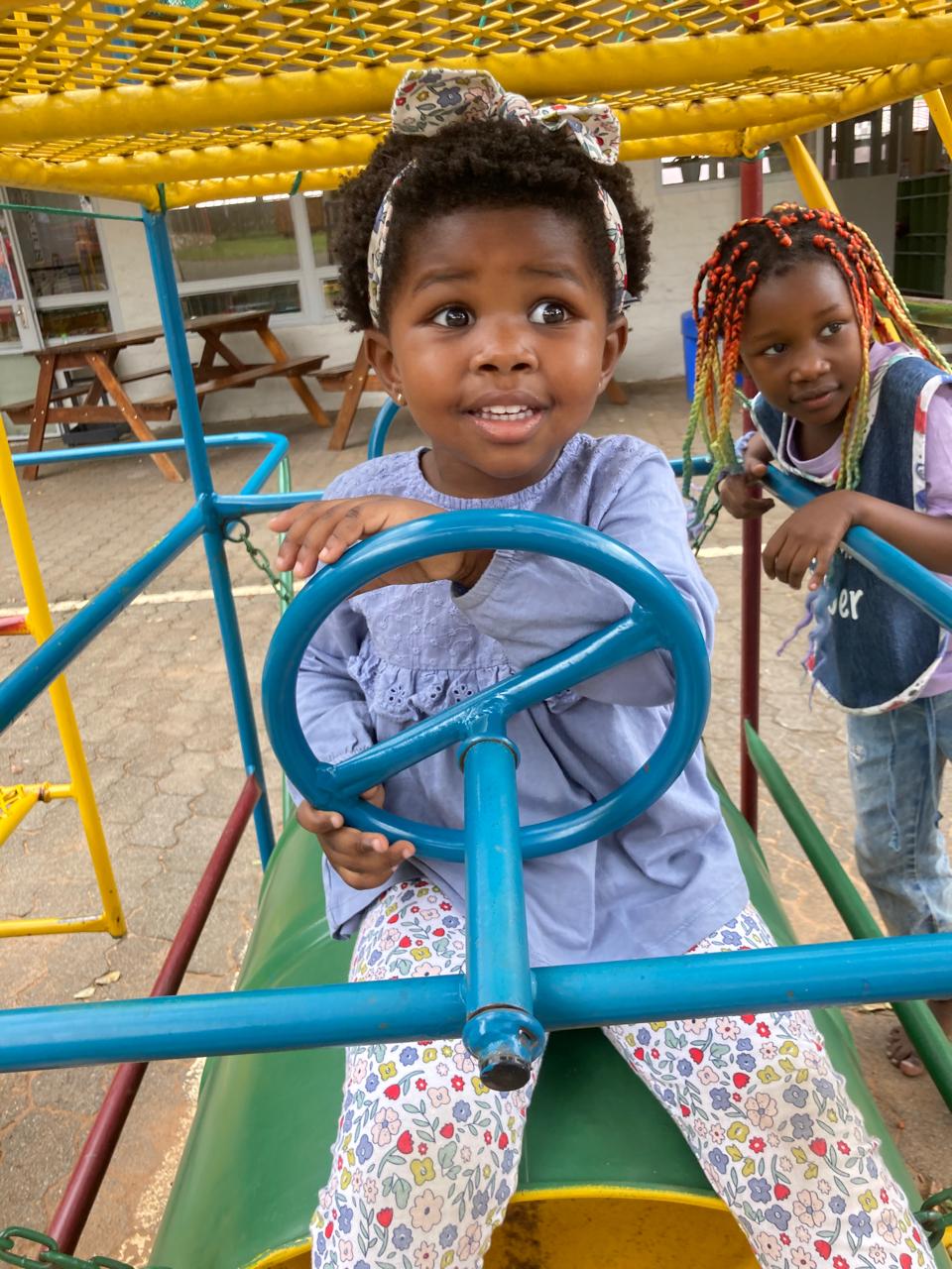 Teacher smiling in classroom